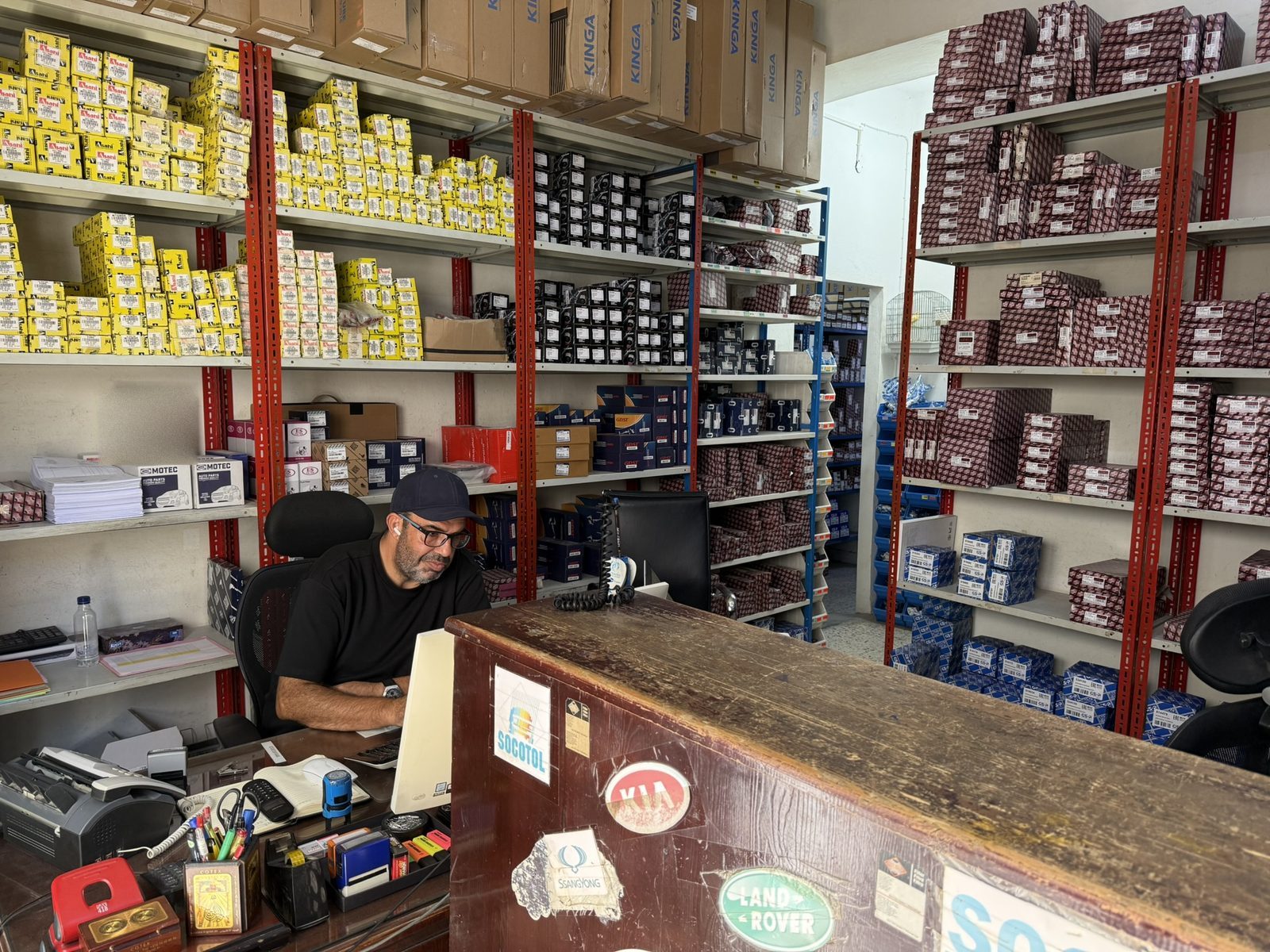 The counter at the Sfax branch: parts shelving and order taking.